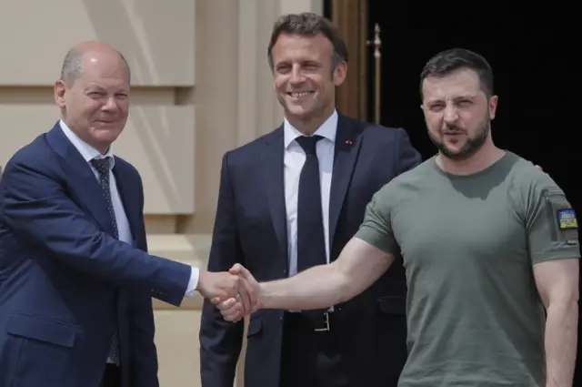 Volodymyr Zelensky greets German Chancellor Olaf Scholz