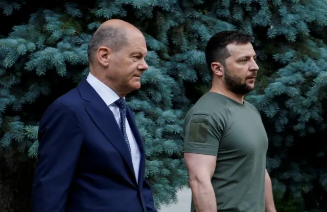 German Chancellor Olaf Scholz and Ukrainian President Volodymyr Zelensky attend a joint news conference
