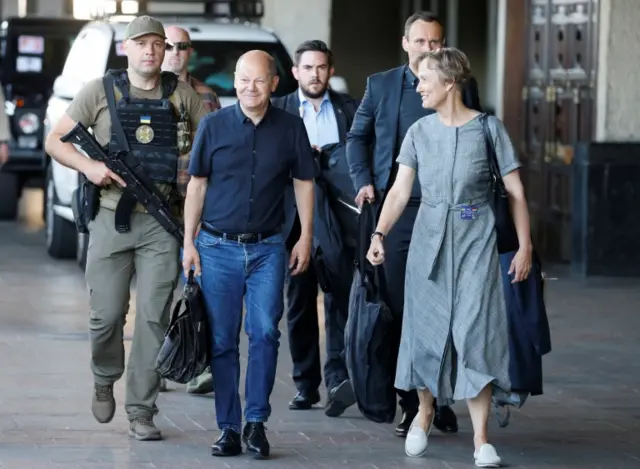 German Chancellor Olaf Scholz arrives at the train station in Kyiv this morning