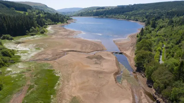 Low water levels can be seen in Llwyn-on reservoir in the Brecon Beacons