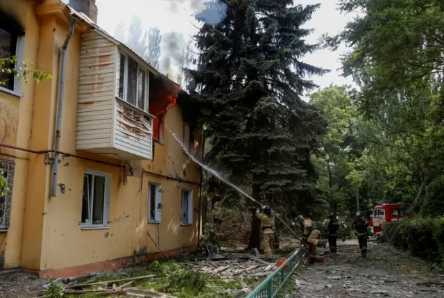 Firefighters tackling a blaze in Donetsk, 17 June