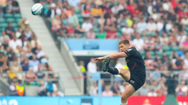 Owen Farrell kicks