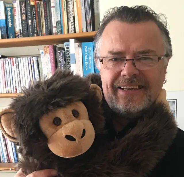 Author Jon Blake and one of his characters which is a cuddly monkey.