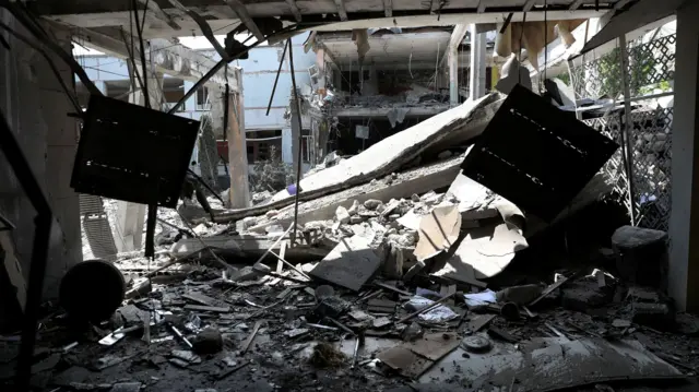 A damaged school after a missile strike in Kharkiv