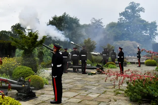 The 206 Battery of the Royal Artillery, the Ulster Gunners, fire a midday commemorative gun salute