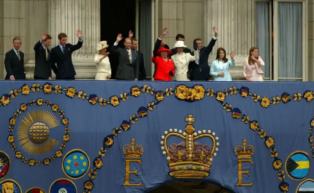 Queen Elizabeth and her family wave to the crowd from the balcony of Buckingham Palace during celebrations for the Queen's Golden Jubilee on 4 June 2002 in London