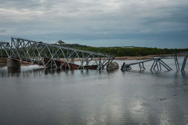 A destroyed railway bridge, over the Siverskyi Donets river, in Raygorodok, eastern Ukraine in April 2022