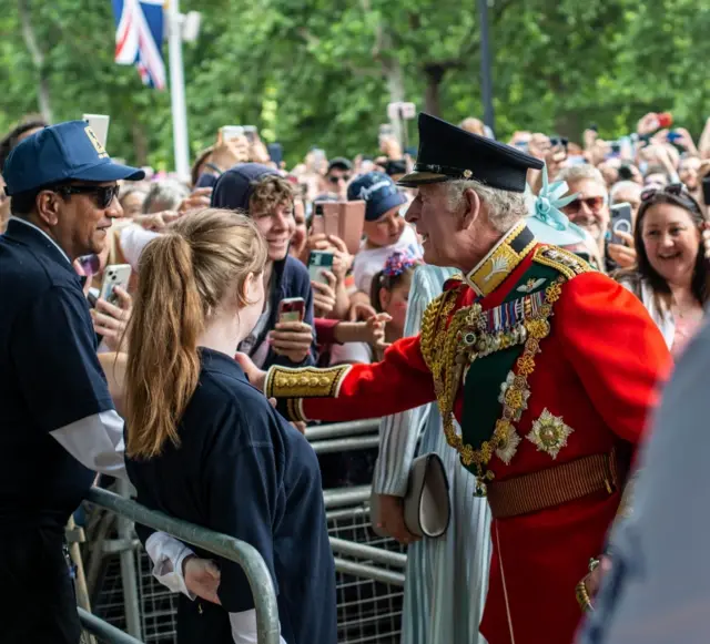 Charles speaking to well wishers