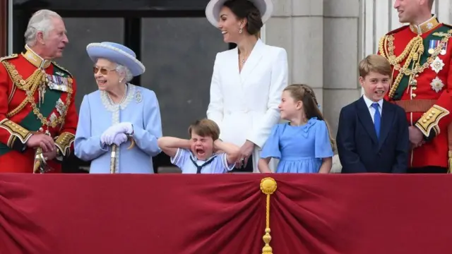 Prince Charles, the Queen, the Duke and Duchess of Cambridge and their three children on Buckingham Palace Balcony