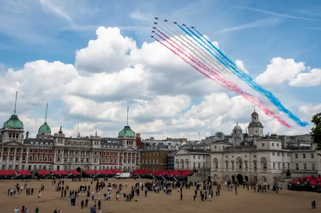 RAF Red Arrows perform a flypast over Horse Guards Parade and Buckingham Palace