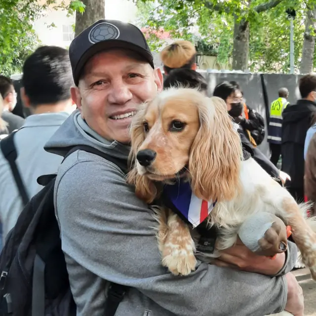 Member of the public Juan and his dog Milo