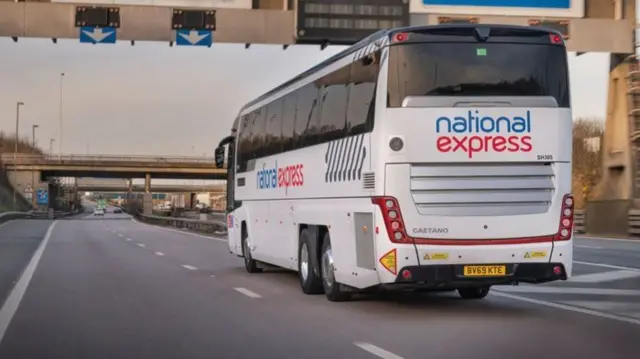 A white bus with National Express branding on the back and side.