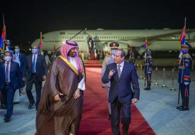 Crown Prince Mohammed bin Salman (L) is welcomed by Egyptian President Abdel Fattah al-Sisi (R) at Cairo International Airport in Egypt, on 20 June 2022.