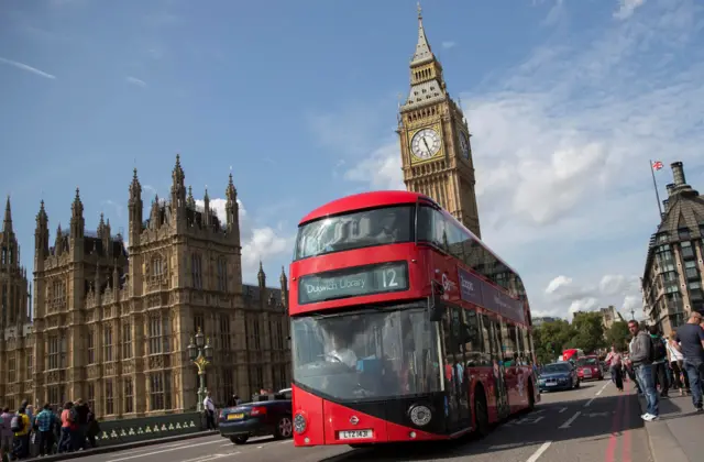 A bus crosses Westminster Bridge in London