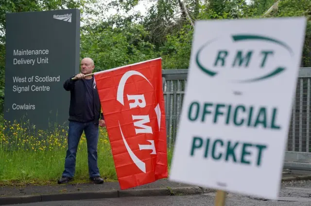 An RMT picket line was set up on Tuesday outside of the Network Rail Maintenance Delivery Unit and West of Scotland Signal Centre in Cowlairs, Glasgow