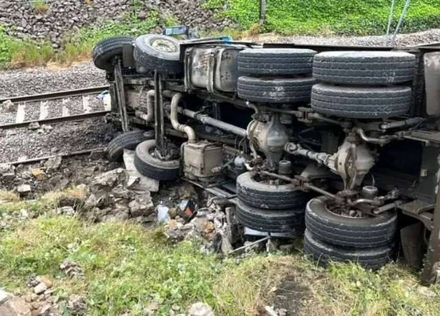 The lorry crashed onto the tracks in East Lothian