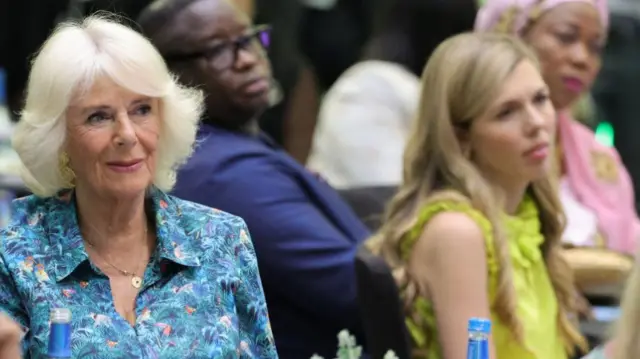 Camilla, Duchess of Cornwall and Carrie Johnson, wife of Prime Minister Boris Johnson (R) attend a Violence Against Women and Girls event at the Kigali Convention Centre on June 23, 2022 in Kigali, Rwanda