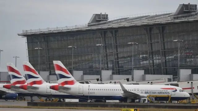 Grounded British Airways planes sit on the tarmac at Heathrow airport