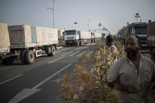 Trucks containing aid are seen parked before leaving with a 130 trucks aid convoy directed to Ethiopia's Tigray region on the outskirts of Semera, Afar region, Ethiopia, on May 15, 2022