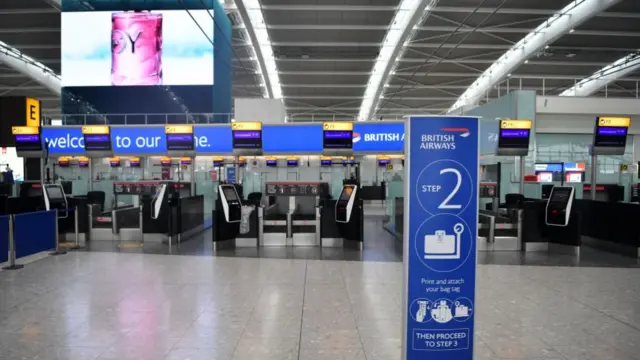 Empty BA desks at Heathrow