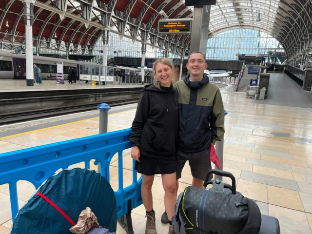 Festival-goers heading to Glastonbury from Paddington Station