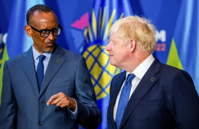 Rwandan President Paul Kagame and British Prime Minister Boris Johnson attend the opening ceremony of the Commonwealth Heads of Government Meeting