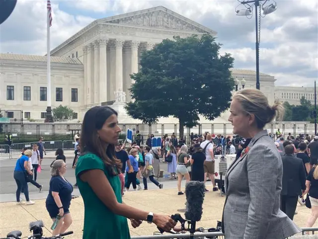 Nomia interviewing Congresswomen Madeleine Dean.