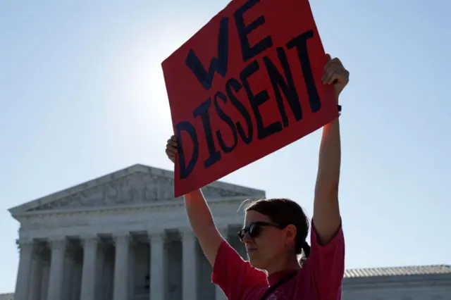 A pro-choice protester outside the court