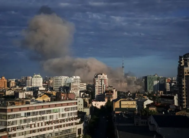 Smoke rises over Kyiv after a series of Russian missile strikes