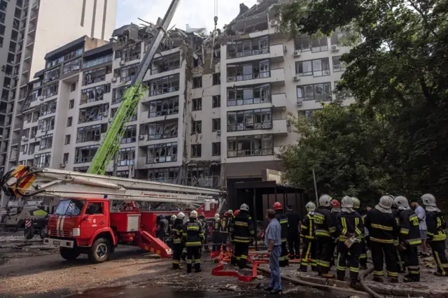 The damaged residential building in Kyiv