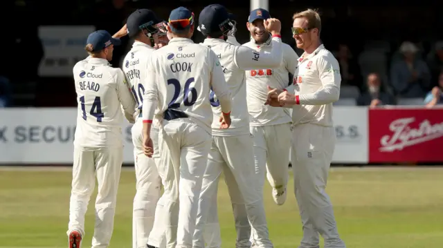 Essex celebrate a Simon Harmer wicket.