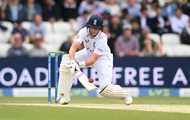 Joe Root's scoops shot