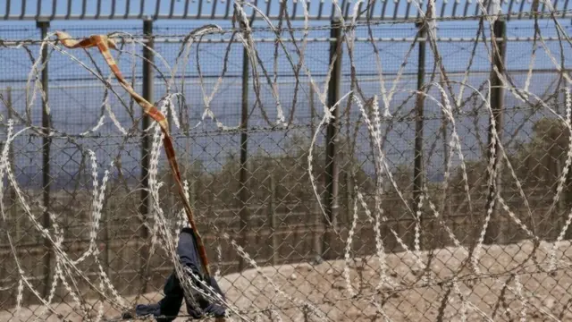 A border fence between the territories.