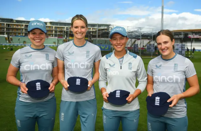 Left to right: Alice Davidson-Richards, Lauren Bell, Issy Wong and Emma Lamb with their Test caps