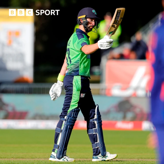 Andrew Balbirnie celebrates his half-century