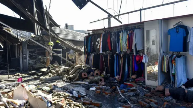 Remains of the destroyed Amstor shopping mall in Kremenchuk