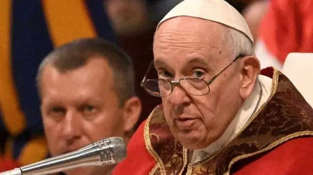 Pope Francis speaking to the crowds at St Peter's Basilica in Rome on Wednesday