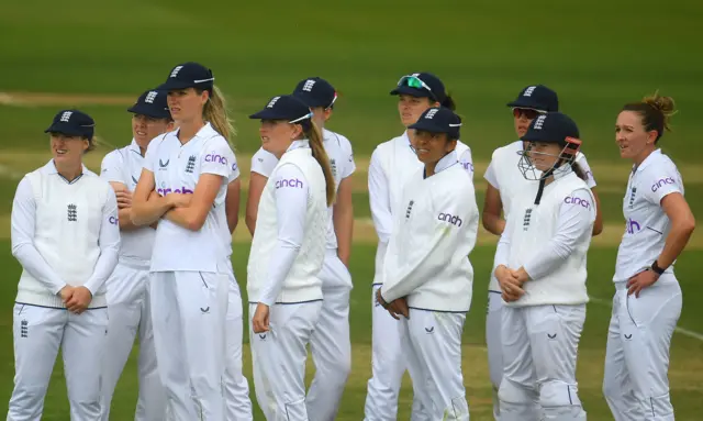 England players await result of a review during Test v South Africa at Taunton