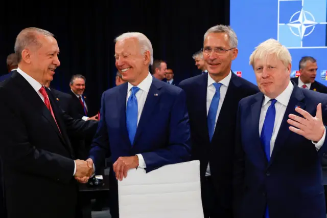 (L-R) Turkish President Tayyip Erdogan, US President Joe Biden, Nato Secretary General Jens Stoltenberg and British PM Boris Johnson greet one another