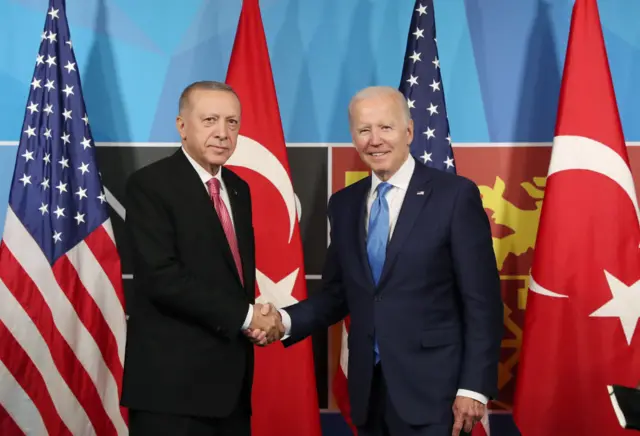 President Erdogan and President Biden shaking hands at the Nato summit in Madrid