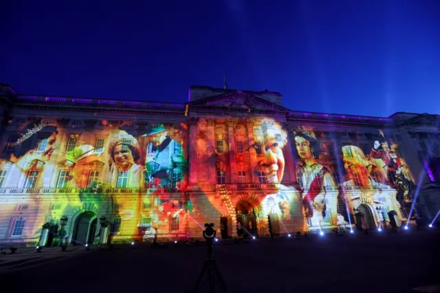 Projections are seen displayed on the front of the Buckingham Palace during the lighting of the principal jubilee beacon