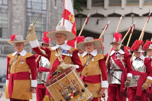 Members of the City of London Company of Pikemen and Musketeers march outside Guildhall