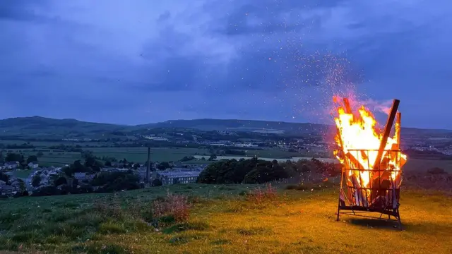 The beacon over Carleton in Craven, Skipton was lit shortly before 22:00 BST