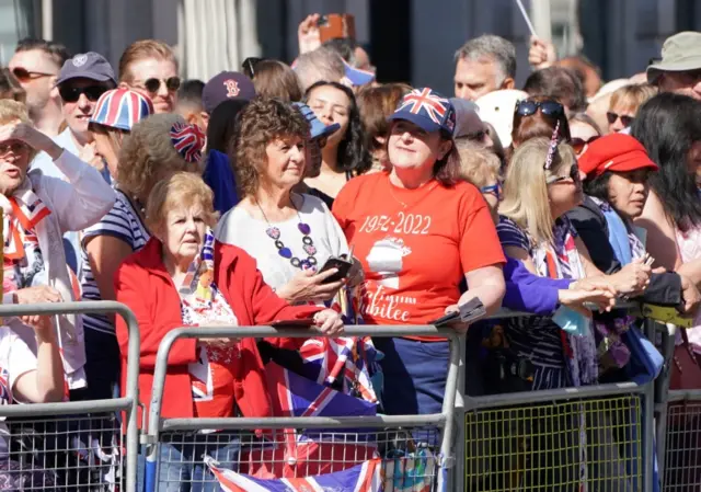 Well wishers wait for the arrival of the Britain"s Royal Family ahead of the National Service of Thanksgiving at St Paul"s Cathedral,