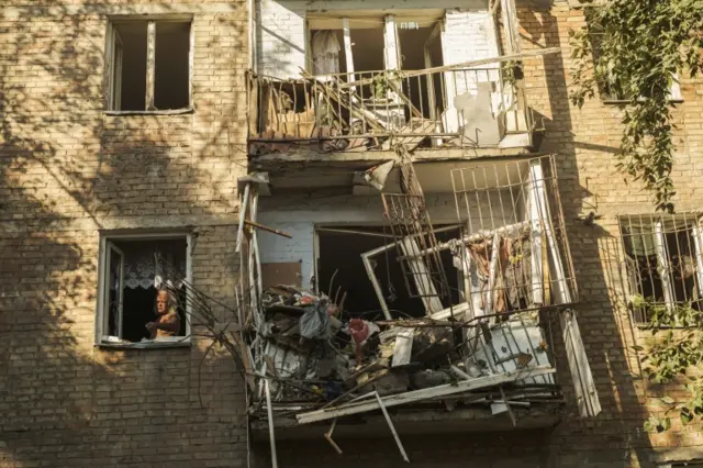 A building damaged by shelling in Mykolaiv