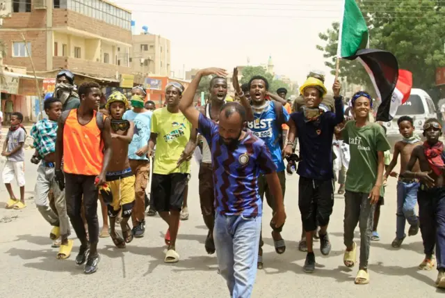 People march during a demonstration against military rule in the Bashdar area of el-Diam district of Sudan's capital Khartoum on June 16, 2022