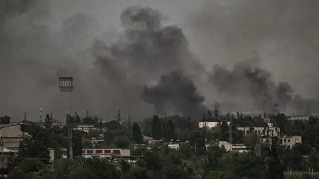 Smoke and dirt rise in the city of Severodonetsk during fighting between Ukrainian and Russian troops