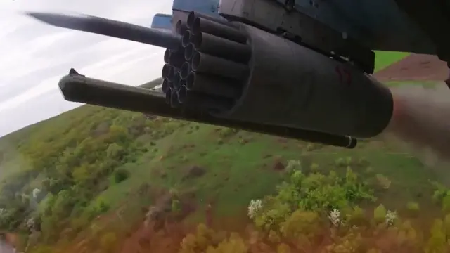 A Russian Ka-52 ‘Alligator’ helicopter firing missiles