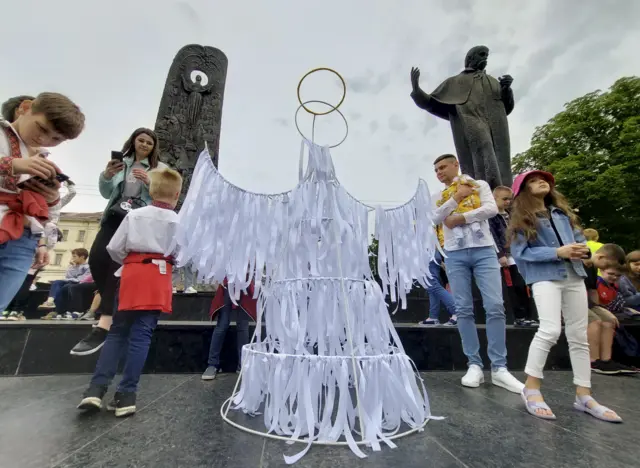 An angel sculpture made of white ribbons in Lviv