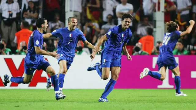 Fabio Grosso (right) of Italy celebrates scoring against Germany in the 2006 World Cup semi-final